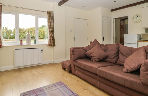 Storwood Cottage | THE PADDOCK, with open fire in York