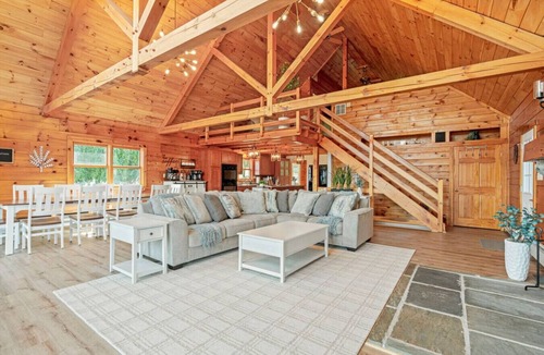 Mattawana Cabin | The perfect family retreat, hot tub, fire pit, playhouse for the kids with a zip line! Plenty of fun for the young and old alike! All while enjoying the majestic views of Juniata County.