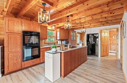 Mattawana Cabin | The perfect family retreat, hot tub, fire pit, playhouse for the kids with a zip line! Plenty of fun for the young and old alike! All while enjoying the majestic views of Juniata County.