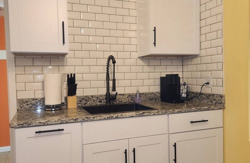 Medford Apartment | The Pool House, step into a backyard oasis.