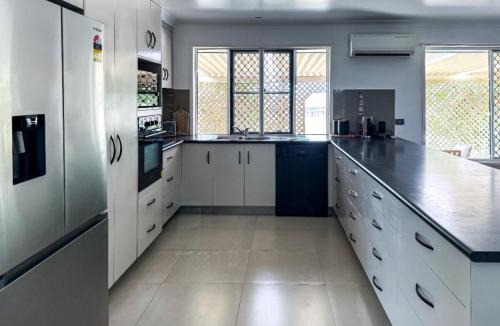 Mackay House | The Ranch 4brm,3bth,AC,Pool