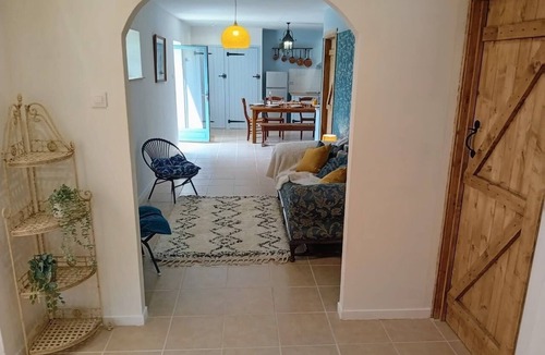 Plomodiern House | The Red Squirrel - stable cottage with shared heated pool 10 mins from beach