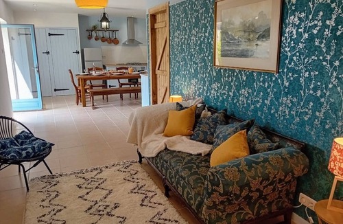 Plomodiern House | The Red Squirrel - stable cottage with shared heated pool 10 mins from beach