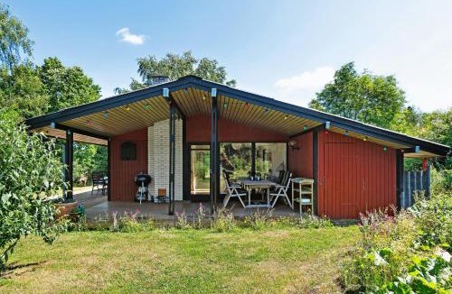 Hoeve Strand House | The Red Summer House With The Lush Garden At Asnæs
