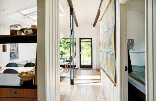 Hoeve Strand House | The Red Summer House With The Lush Garden At Asnæs
