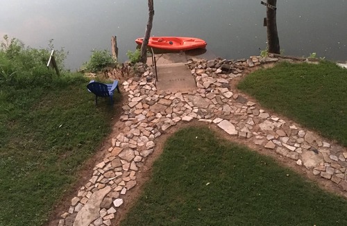 Hardy Cabin | The River Cabin at Miramichee Falls in Hardy on the waterfront with kayaks