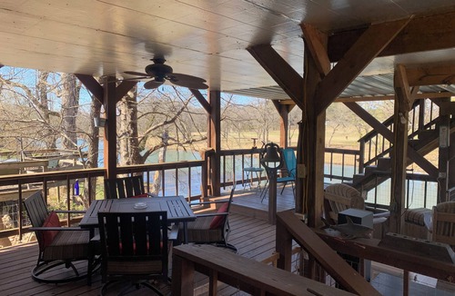 Hardy Cabin | The River Cabin at Miramichee Falls in Hardy on the waterfront with kayaks