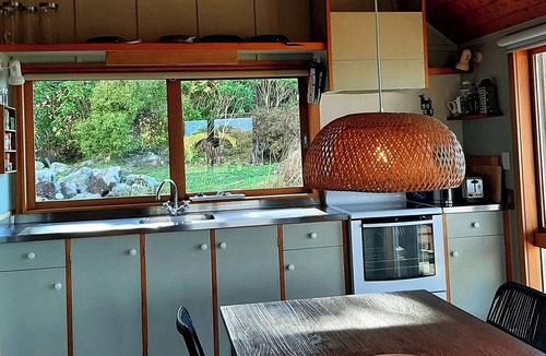 Tuateawa House | The Rock " Serene, Tranquil, Awesome"