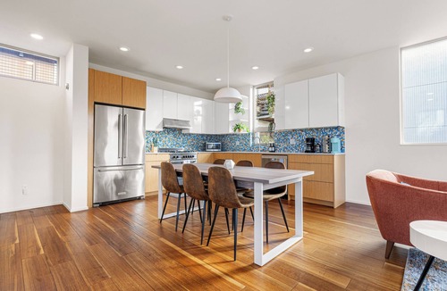 Central District House | The Rooftop Blue Haven Home w Firepit