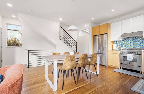 Central District House | The Rooftop Blue Haven Home w Firepit