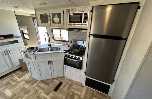 Tow House | The RV Sleeps 8 - 36'