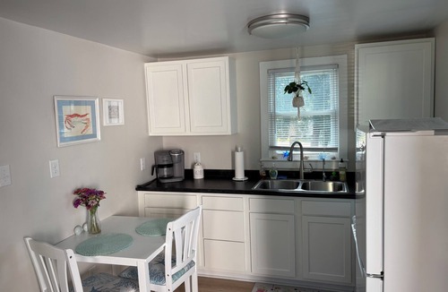 North Carolina Coast Apartment | The Sand Bucket is within walking distance to the beach and boardwalk.