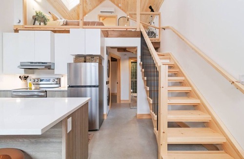 Newburne Cabin | The Scandi Riverside Retreat Hot Tub