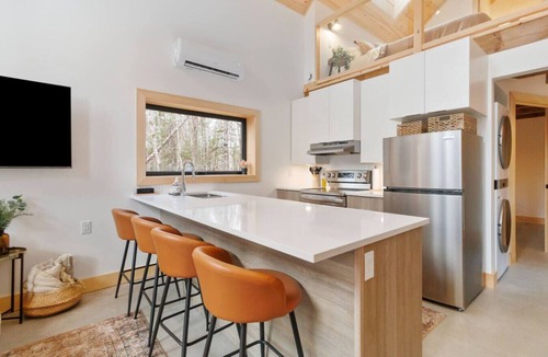 Newburne Cabin | The Scandi Riverside Retreat Hot Tub