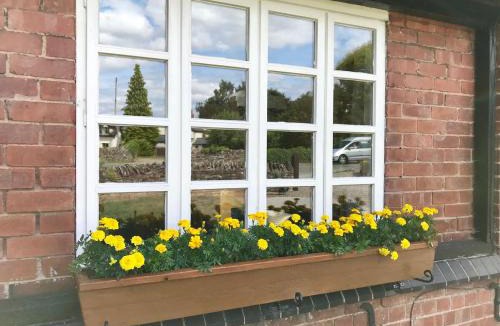 Bodenham House | The Smithy, Wonderful Riverside Accommodation