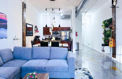 Downtown Memphis Apartment | The Stallion #103 - Walk to Attractions - Modern 2BD Loft in Downtown with Patio