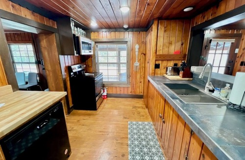 Lampe House | The Stone Schoolhouse - Gated Lakefront Acreage with views and historic charm
