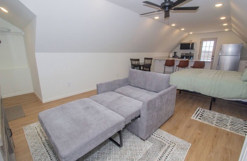 Waynesville Apartment | The Studio on Rainbow is a cozy and functional studio apartment located in Waynesville, just minutes from Fort Leonard Wood. Perfect for short or extended stays, this space offers a queen bed, twin pullout, full kitchen, and modern essentials
