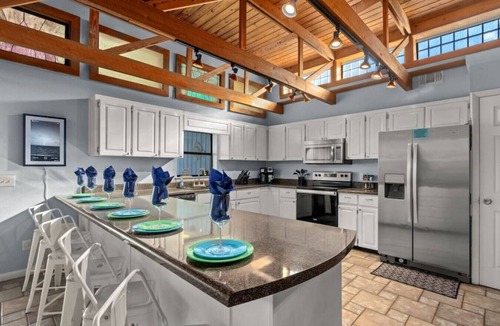 Thomas Drive House | The Tiki Hut ~ Tropical Retreat with Pool, Tiki Bar, Game Room & Dog-Friendly Vibes