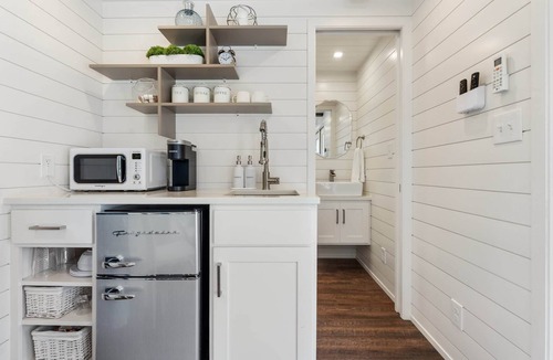 Dennis House | The Tiny 'Tainer | Tiny Shipping Container with HOT TUB