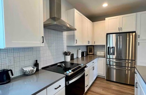 Downtown House | The Tipton House — Modern 3BR + Rooftop in Raleigh