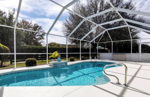 The Villages House | The Villages POOL home with a golf course view