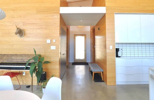 Merlin House | The Wave House | Waterfront, Pool, Sauna