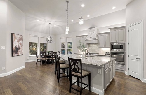Dallas House | This beautiful 3200 SF single storey with loft backs onto a heavily treed forest