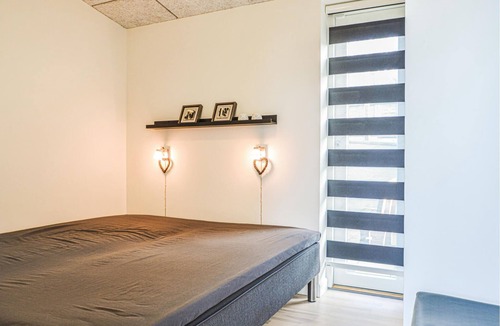 Hjarbæk House | This beautiful cottage offers excellent views as it is elevated.
