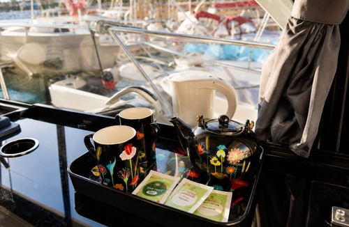 La Condamine Boat Rental | This boat accommodation features two separate bedrooms, a fully equipped kitchenette with a refrigerator and stovetop, and one bathroom. Towels and bed linen are provided for your stay.