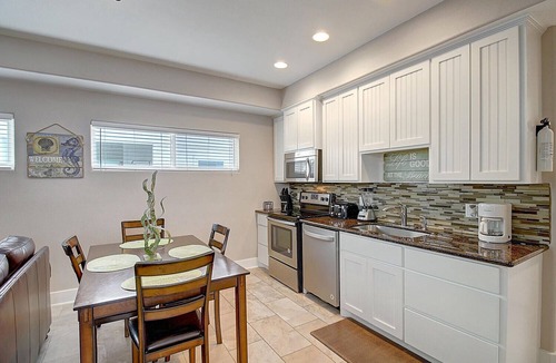 Port Aransas House | This charming beach bungalow is located right next to the community pool and clo