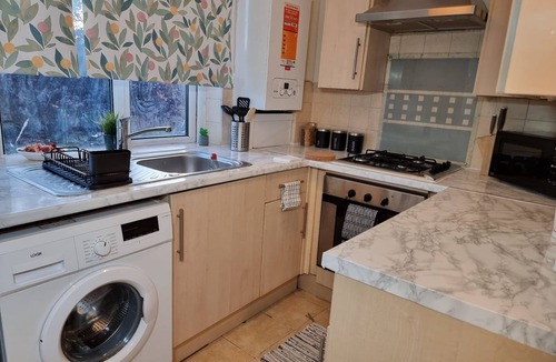 Harlington House | This charming house with balcony