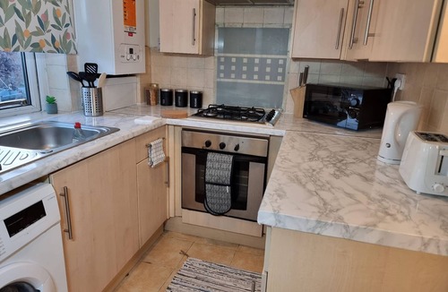 Harlington House | This charming house with balcony