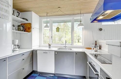 Stubbekobing House | This cozy cottage is located in Sortsø Strand, near Stubbekøbing.