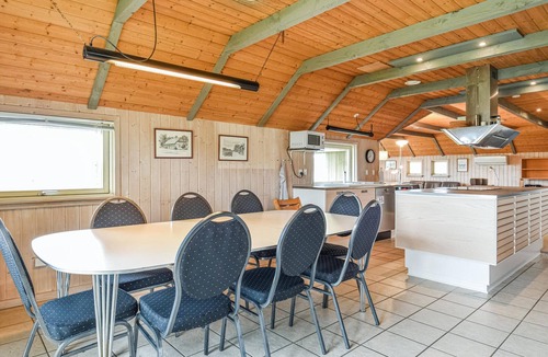 Houvig Strand House | This cozy cottage is located under a romantic thatched roof.
