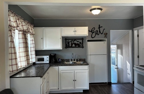 Helena House | This cozy house has been completely remodeled inside and features three bedrooms.