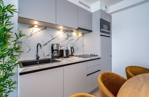 Camiers Apartment | This family suit is equipped with a bedroom with a double bed & 2 sleeping corners with a bunk bed.