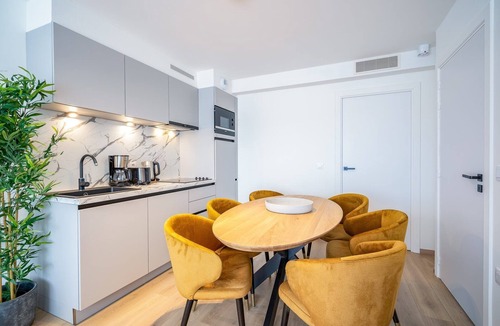 Camiers Apartment | This family suit is equipped with a bedroom with a double bed & 2 sleeping corners with a bunk bed.
