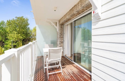 Camiers Apartment | This family suit is equipped with a bedroom with a double bed & 2 sleeping corners with a bunk bed.