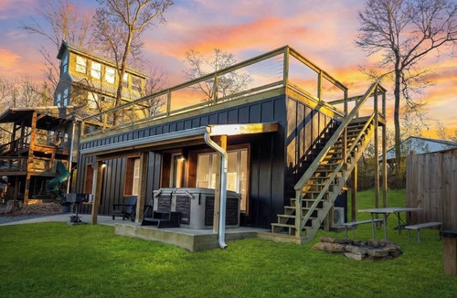 South Pittsburg Cabin | This is IT Cabin with a hot tub, fire pit, & indoor pool!