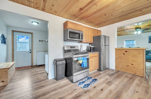 Spirit Lake House | This lake getaway on the `Narrows` off East Lake offers easy access to boating, fishing, & nightlife
