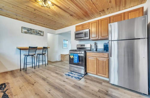 Spirit Lake House | This lake getaway on the `Narrows` off East Lake offers easy access to boating, fishing, & nightlife