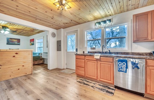 Spirit Lake House | This lake getaway on the `Narrows` off East Lake offers easy access to boating, fishing, & nightlife
