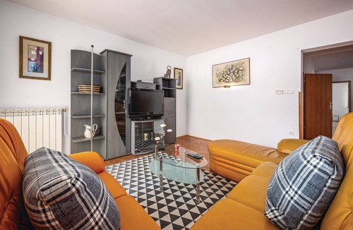 Rogocana House | This Mediterranean vacation home with pool and beautifully landscaped garden is located in a settlem