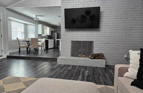 Odessa House | This modern 4-Bedroom features a spacious interior and exquisite backyard.