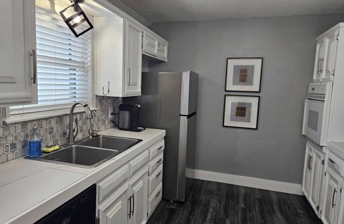 Odessa House | This modern 4-Bedroom features a spacious interior and exquisite backyard.