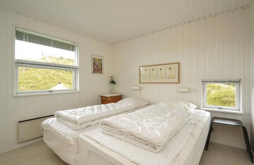 Rindby Strand House | This renovated cottage has among other things a beautiful kitchen with skylight, window front to the