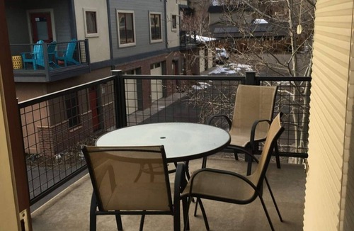 Salida Condo | This riverfront downtown condo boasts and open floor plan for kitchen, living room, and dining areas. Or step onto the balcony over the Arkansas River to hear the water rushing by. Oversized master suite has its own balcony and indoor sitting area.