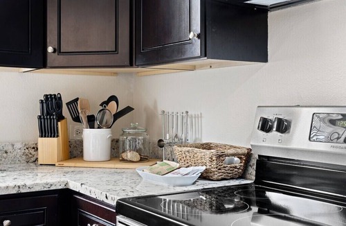 Kessler Apartment | This spacious unit is the entire first floor of a historic triplex dating back to 1912. It has been completely renovated and designed with your comfort in mind. An easy walk (just 1.5 blocks) from Bishop Arts District. Secure gated parking.