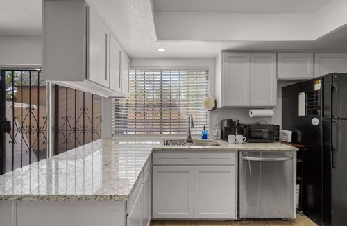 El Paso House | This Spanish-style condo has been stylishly outfitted for your El Paso stay